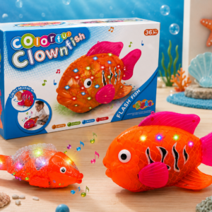 Pez payaso naranja con luces LED y aletas rosas, su caja y un modelo traslúcido sobre un fondo decorado con conchas y temática marina.